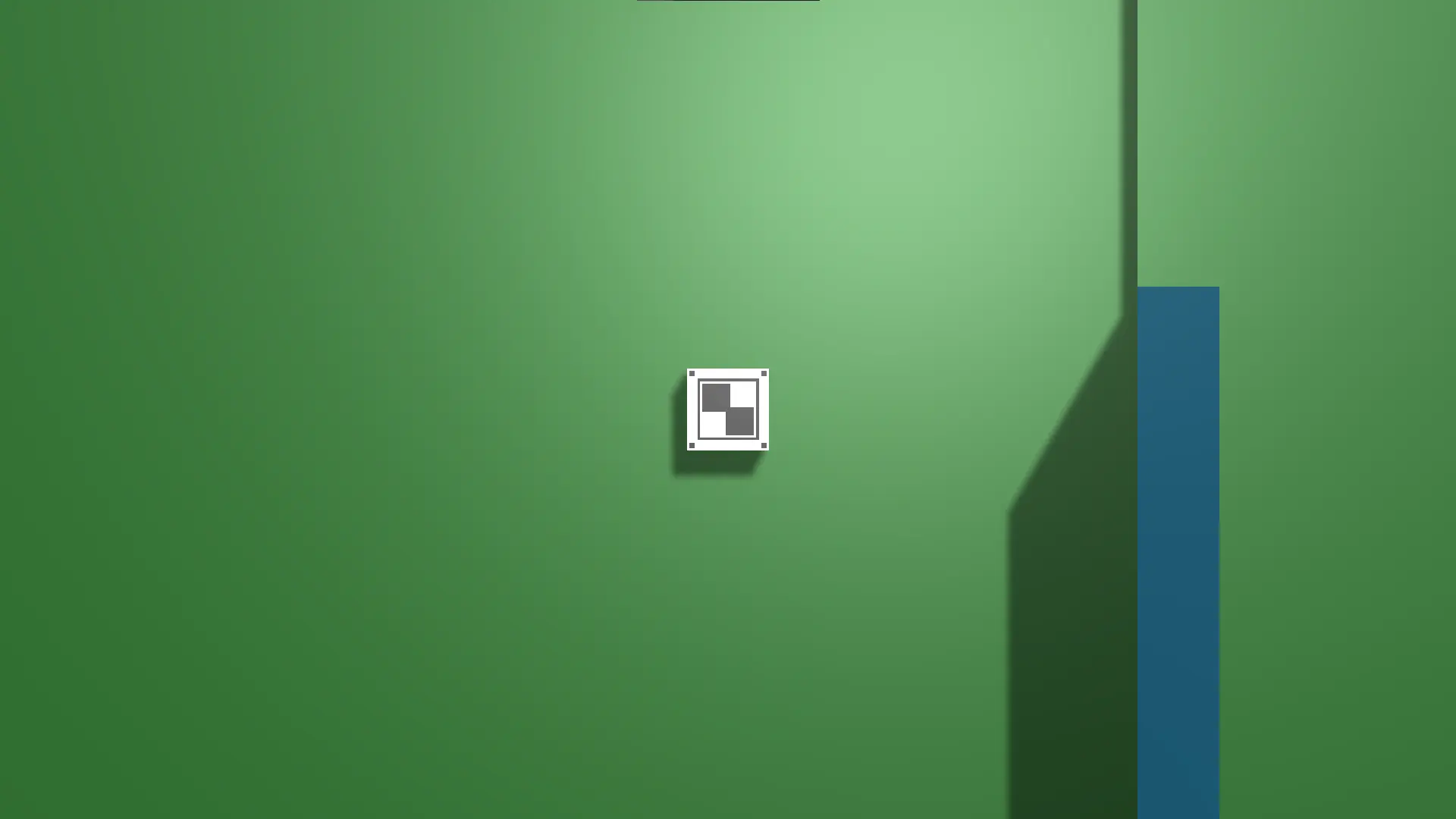 The player is viewed from a top down perspective, set against a green background and a blue wall to their right.